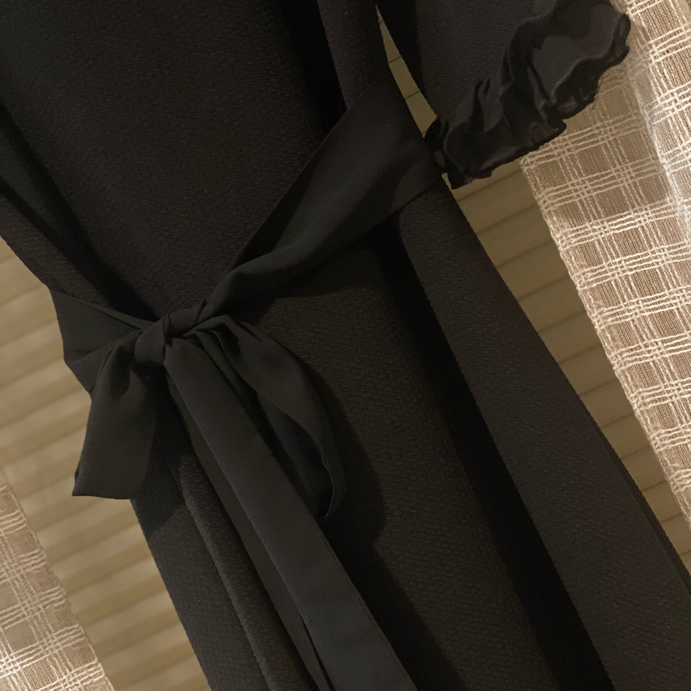 Dainty Jewell’s black knit dress- size M